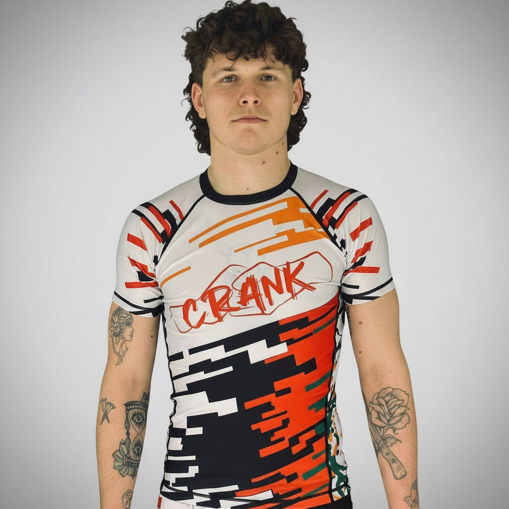 Person wearing a colorful sports outfit with 'Crank' branding against a white background